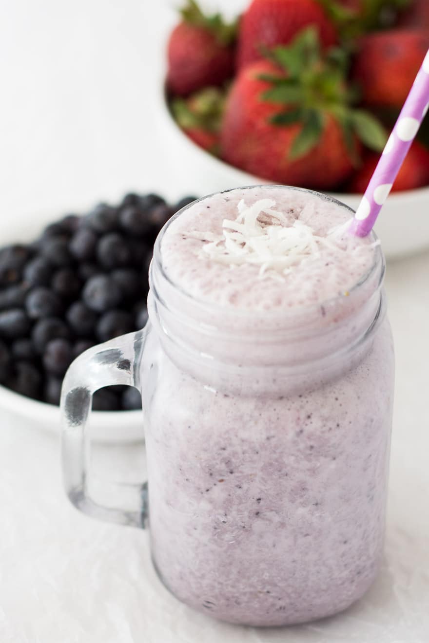 Double Berry Protein Smoothie made with blueberries, strawberries, milk and your favorite vanilla protein powder