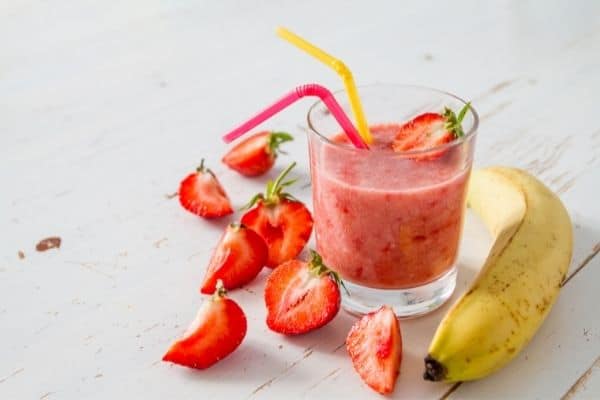 choose smoothie ingredients - strawberries and bananas are great choices!