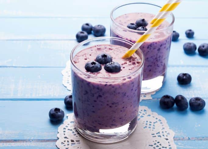 two glasses of blueberry smoothie
