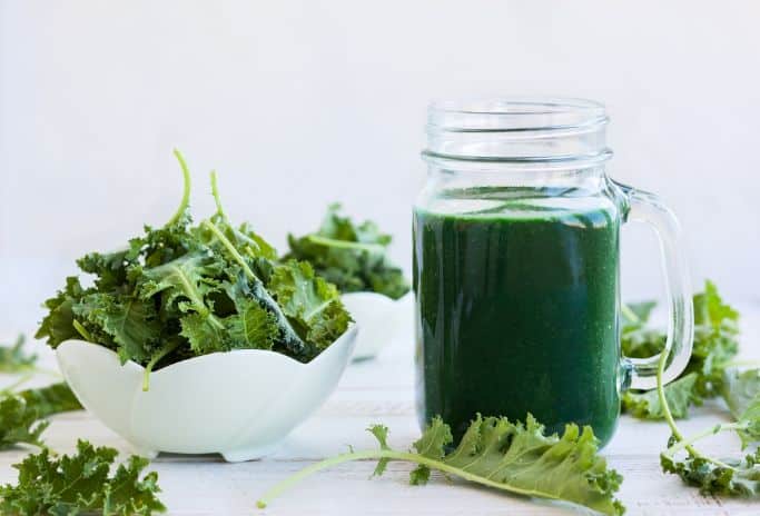kale smoothie and kale leaves