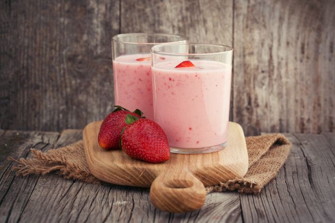 two glasses of strawberry smoothie