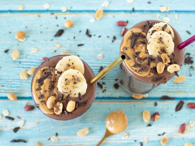 top down view of chocolate peanut butter banana smoothies