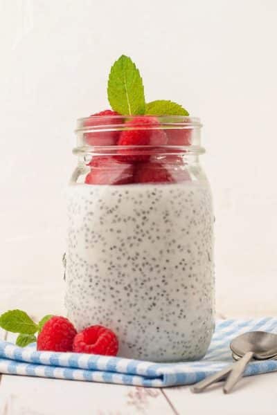 chia seed pudding topped with raspberries